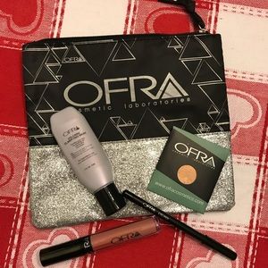New Ofra Cosmetics makeup bag with makeup.